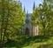 Antique gothic chapel lit by the rays of the sun against