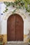 Antique greek colored doors in Mustafapasa pictuesque village, Cappadocia. Turkey