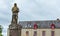 Antique house of the French Brittany and military statue