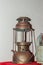 Antique hurricane lantern, shot with flash light. Vintage storm
