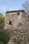 Antique Italian Architecture: House with Stone Facade and Lamp in Countryside