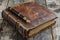 Antique Journal with Fountain Pen on Wooden. Vintage leather-bound journal with a classic fountain pen on an old wooden table