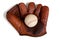 Antique leather baseball glove and ball