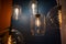 Antique light bulbs. Retro chandeliers with incandescent lamps.