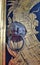 Antique Lion knob and gold monkey painting on temple door