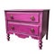 An antique magenta dresser with a distressed finish and elegant silver handles. Trendy color of 2023 Viva Magenta.. AI