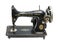 Antique manual sewing machine company Singer on white background