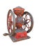 Antique metal coffee grinder isolated.