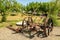 Antique metal mechanical device on wheels for agriculture