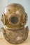 Antique metal scuba helmet, heavy diving equipment with air supp