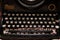 Antique metal typewriter. Vintage typing machine keyboard closeup