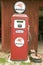 Antique Mobil gas pump in front of red barn off Manchester road, Missouri