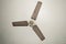 Antique old electronic metal ceiling fan with three blades in vintage house Isolate on white background