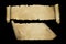 Antique parchment scrolls on black background.