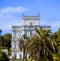 Antique park rome with columns and monuments a lot of greenery and sculptures marble