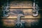 Antique Pipe Wrenches on Wood Background