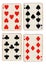 Antique playing cards showing four nines.