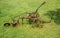 Antique plow at a farm in the summer field