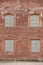 Antique rusted restored red brick wall facade. Architecture Back