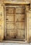 Antique rustic ancient wooden door.