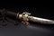 antique samurai sword with a detailed tsuba