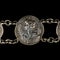 Antique silver bracelet with female profile in Greek style.