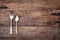 Antique Silverware over Rustic Wooden Background