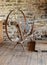 Antique spinning wheel in stone mill