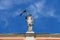 Antique statue on facade of Governor Palace in Piacenza