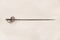 Antique steel rapier with a beautiful handle isolated on a white background, Northern Italy. Cold weapons