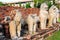 Antique Stupa surrounded by Lion statue cambodia style in Thammikarat Temple