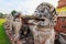 Antique Stupa surrounded by Lion statue cambodia style in Thammikarat Temple