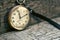 Antique swiss pocket watch on the wooden boards