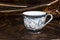 Antique tea cup with dragon