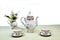 Antique tea tableware on white background