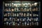 antique teacups displayed in a glass cabinet