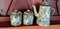 Antique teapot and teacups made of enamel tin called blirik teapots, blirik glasses and blirik teapots for tea, coffee or orange,