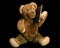 Antique Teddy phoning with a modern smartphone