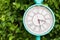Antique turquoise color clock in the garden