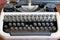 Antique Typewriter. Vintage Typing machine keyboard Closeup