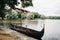 An antique Viking ship on the river. Old boat