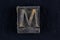 Antique vintage movable type alphabet letter M