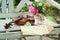 Antique violin, notes and spring bouquet