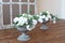 Antique White Italian Urn Planter with flowers in white baroque style room