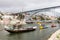 Antique winery boats moored at Douro river in Porto, Portugal
