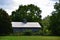 Antique wood barn with cupola in countryside