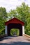 Antique Wood Covered Bridge on Quiet Country road