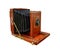 Antique wooden camera isolated.