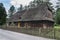 An antique wooden cottage with a log construction without remnants from 1831.