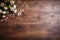 Antique wooden country table with flowers and floral design, wood texture and rustic flatlay background